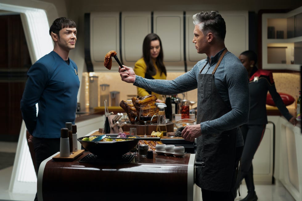 ethan peck as spock, rebecca romijn as una, anson mount as pike, and celia rose gooding as uhura of the paramount original series star trek strange new worlds photo cr marni grossmanparamount