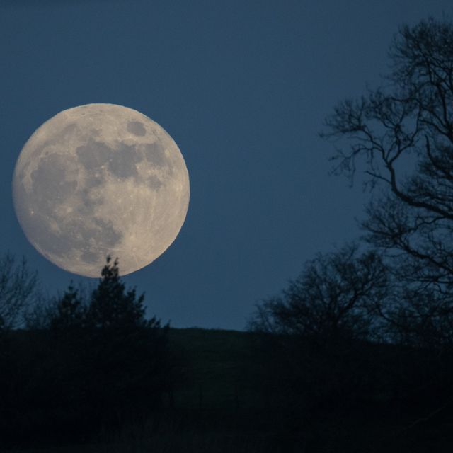 Wolf Moon Rises Over Glastonbury Ahead Of Met Office Severe Weather Warnings