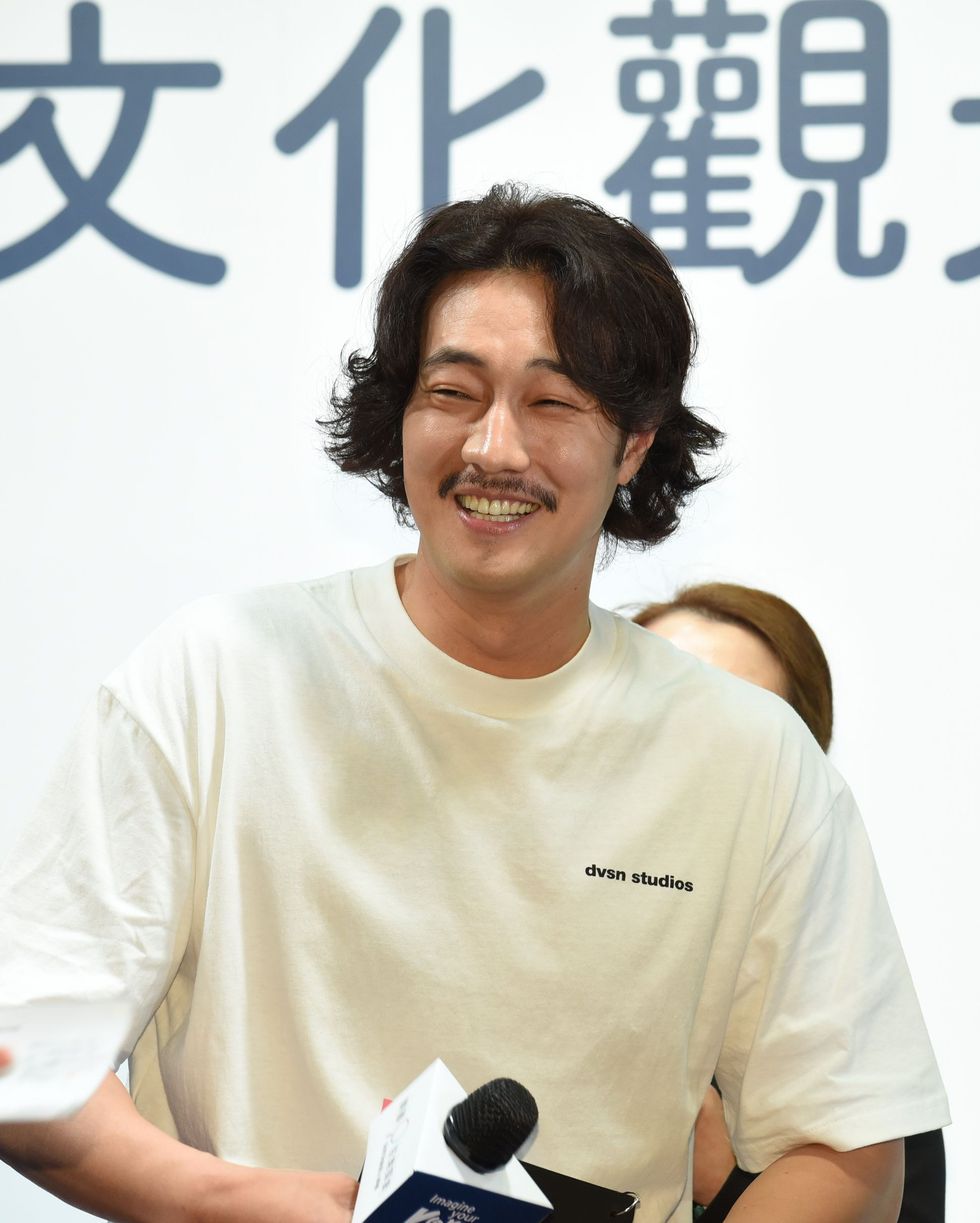 so ji sub attended the taipei itf to promote the korea tourism with long curly hair and mustache in taipei,taiwan,china on 09 november, 2019