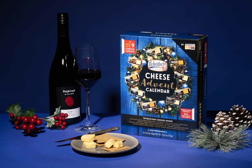 cheese advent calendar with wine and cheese on table