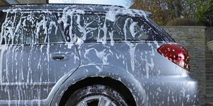 soap suds and water on car, car cleaning, diy car wash