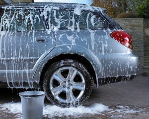 soap suds and water on car, car cleaning, diy car wash