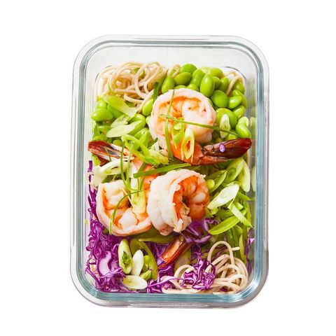 soba noodle salad with shrimp and ginger vinaigrette in a glass container