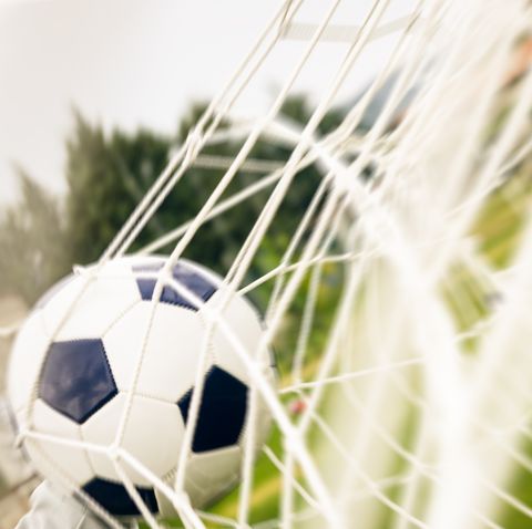 Soccer ball into the net