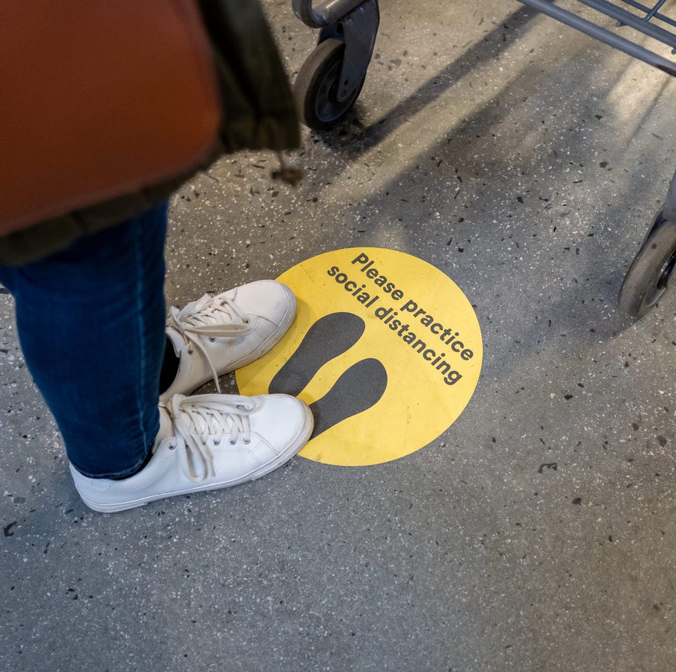 Social Distance Sign on the floor during COVID-19 social distance sign on the floor during covid 19