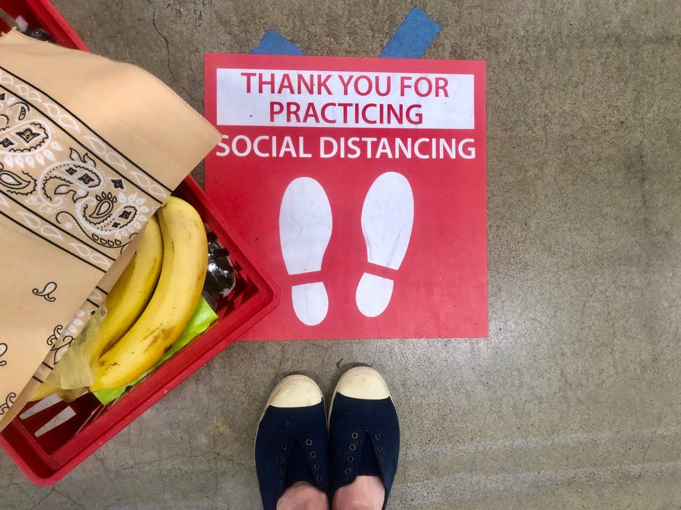 social distancing sign on the floor