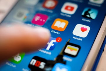 Social media app icons on a smartphone screen