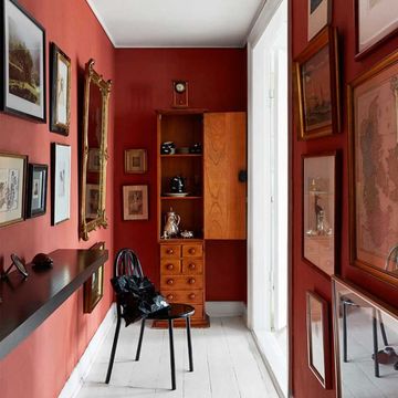 Detail of the red hallway, seen previously in this home in Copenhagen. Dark colours always make wonderful backdrops for artwork. It also makes what could have been a real Cinderella space, into something marvellous. Photographer Birgitta Wolfgang.