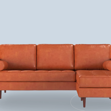 a brown couch with a cord