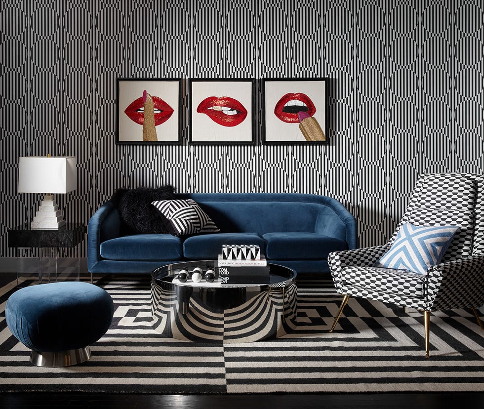 Sofá de terciopelo azul de Jonathan Adler