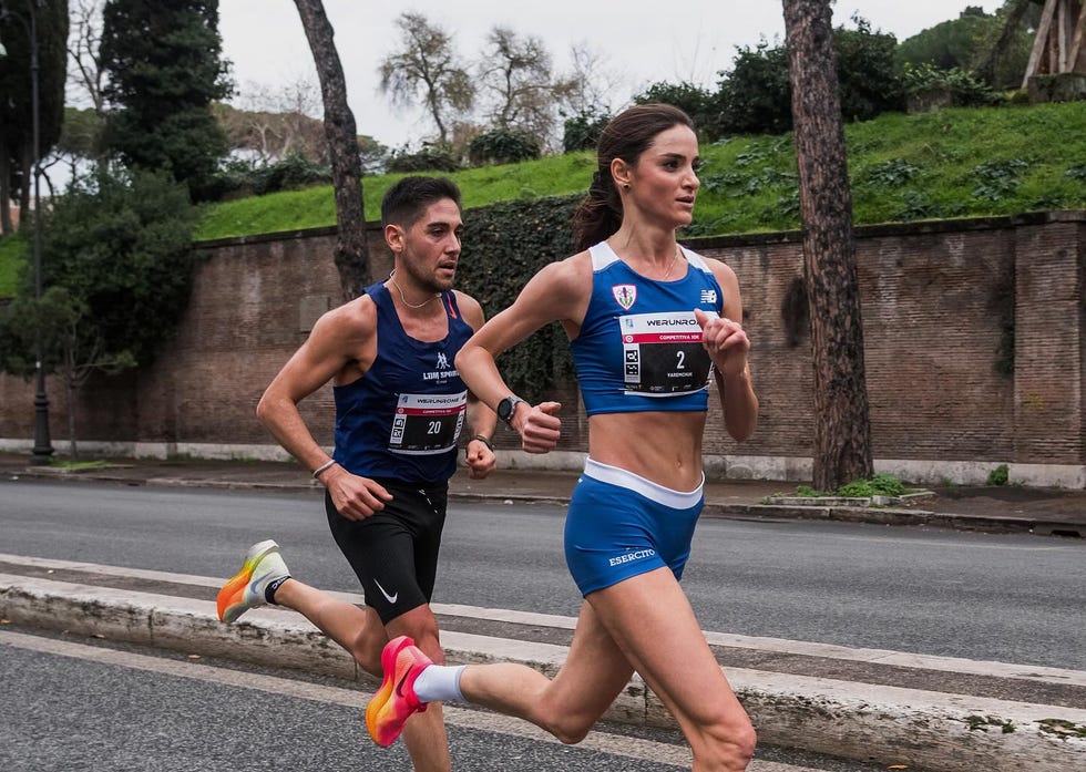 a man and woman running