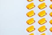 soft fish oil capsules background
