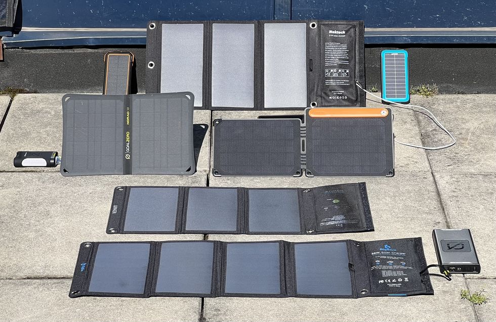 solar phone chargers being tested outside in full sun