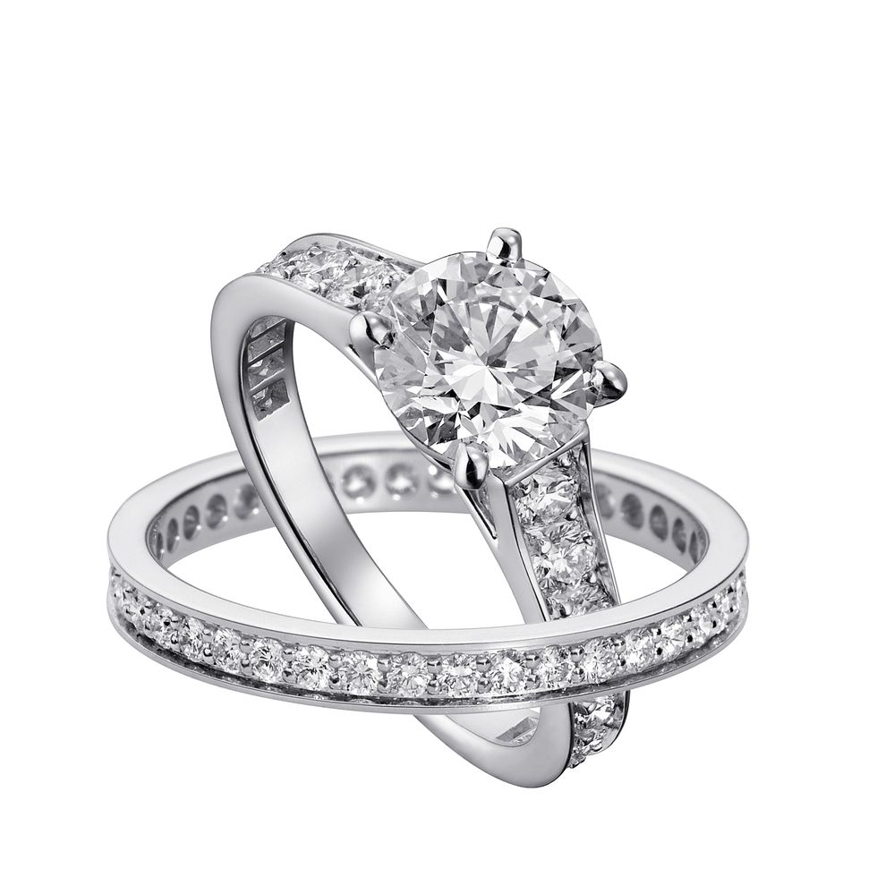 Jewellery, Ring, Fashion accessory, Engagement ring, Pre-engagement ring, Diamond, Platinum, Body jewelry, Wedding ring, Gemstone, 