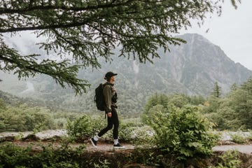 solo female hikerhiking next to mt hotaka