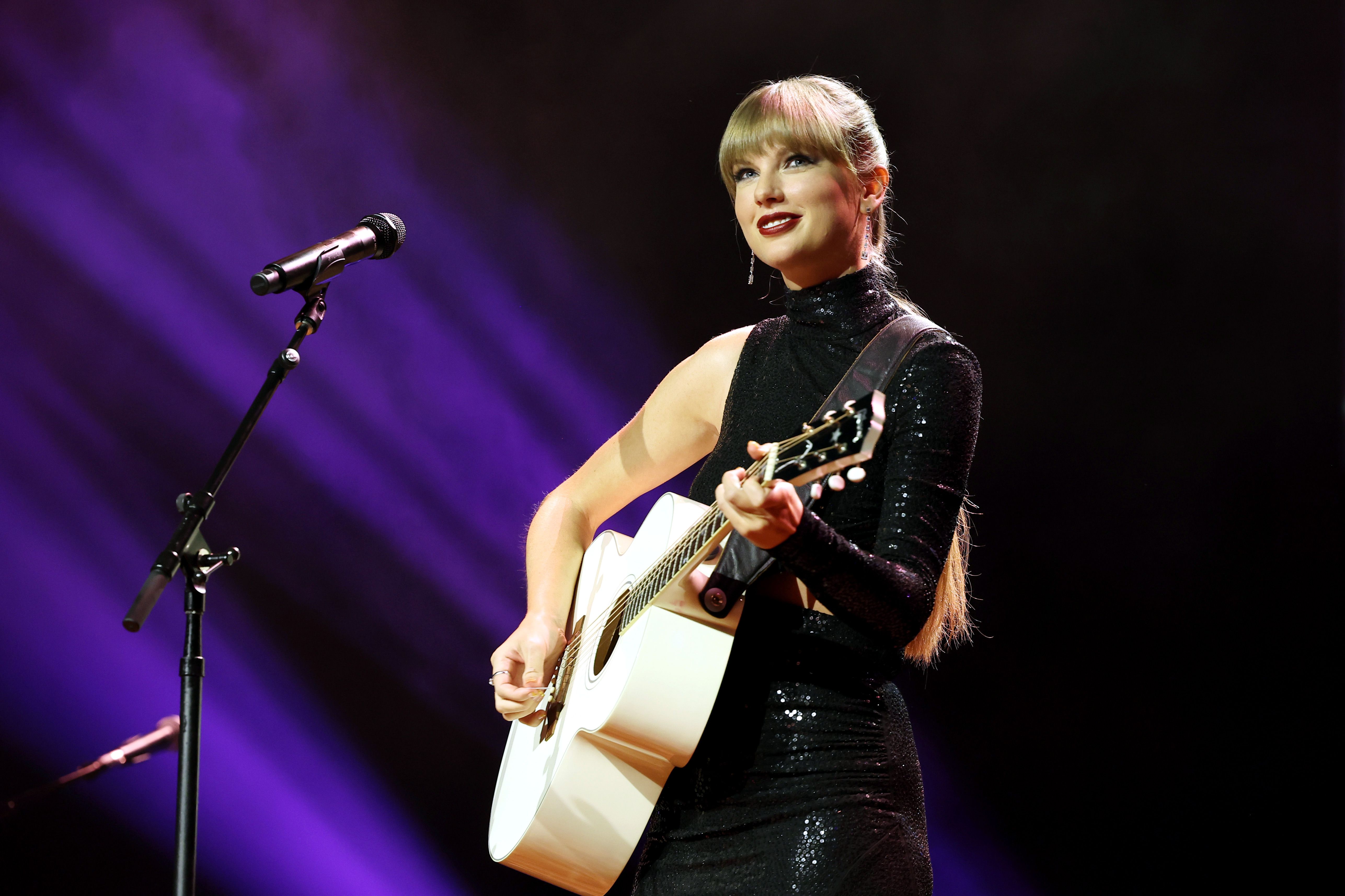 Taylor Swift Sports Striking Asymmetrical Top at Album Release Party
