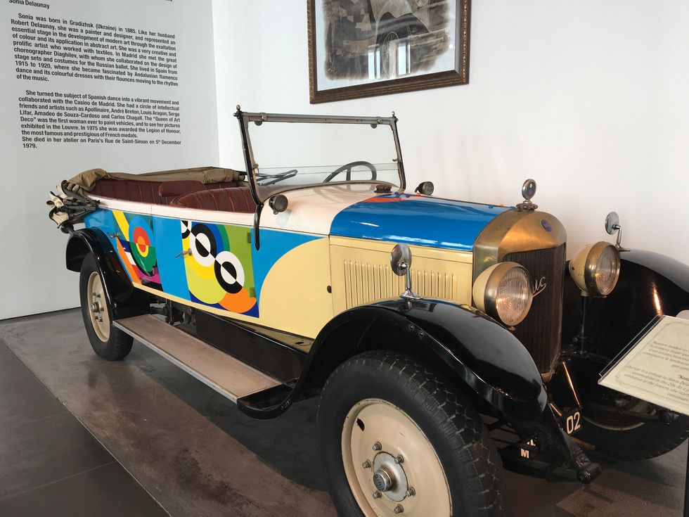 an old car in a museum