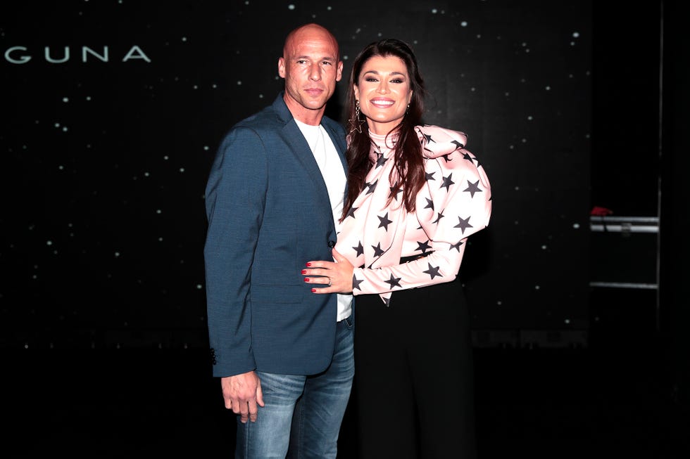 sonia ferrer y su pareja, sergio fontecha, posan en el desfile de hannibal laguna en madrid