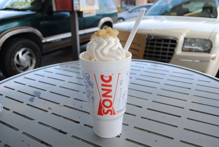 Food, Dessert, Frozen dessert, Cream, Dairy, Milkshake, Ice cream, Whipped cream, Vehicle, Frappé coffee, 