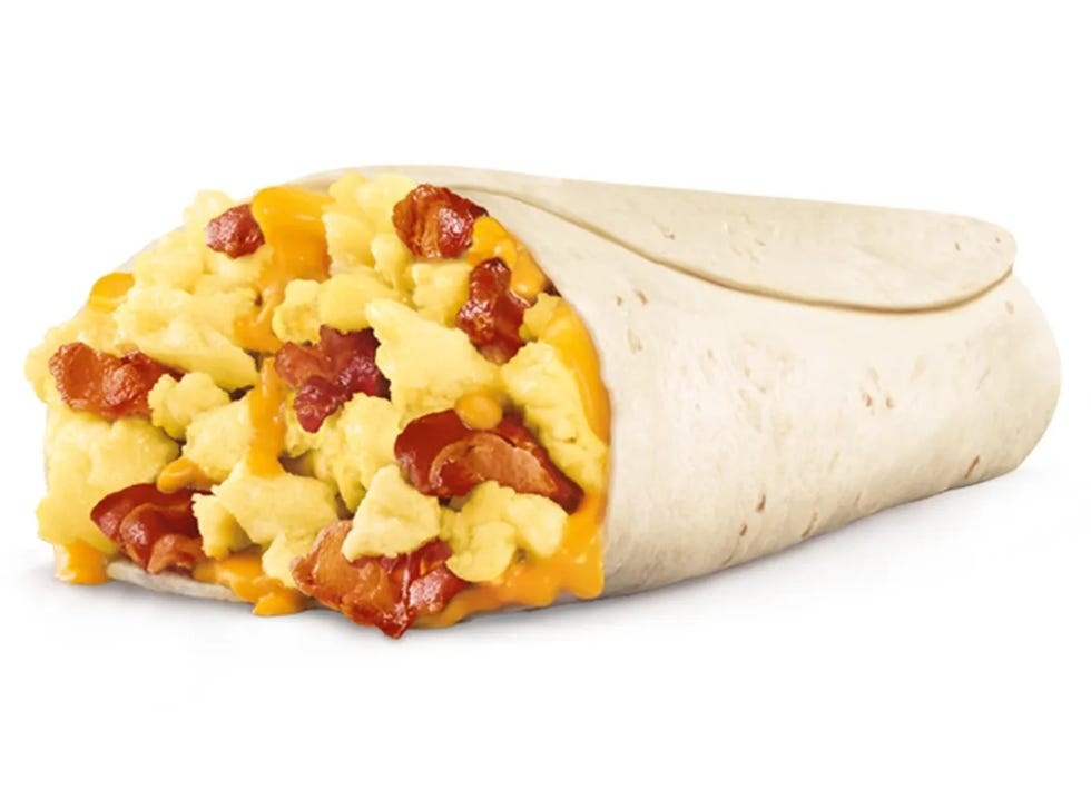 breakfast burrito filled with scrambled eggs cheese and bacon