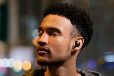 person with closed eyes wearing sony wf 1000mx4 earbuds