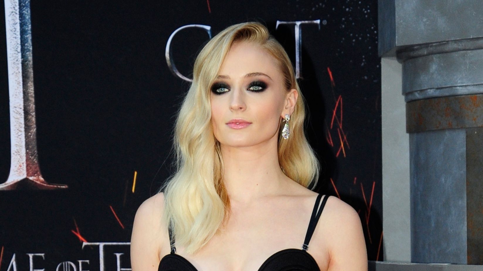 Sophie Turner cuts a chic figure as she discusses Game Of Thrones
