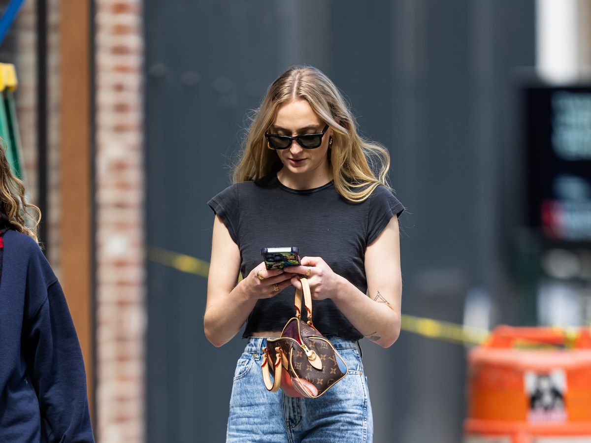 Sophie Turner's Best Street Style Outfits, Photos – Footwear News