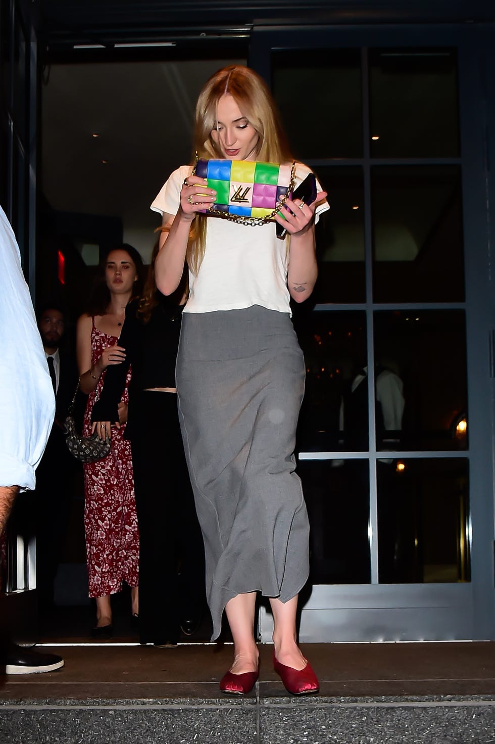 Sophie Turner Takes Louis Vuitton Boots to Dinner with Taylor