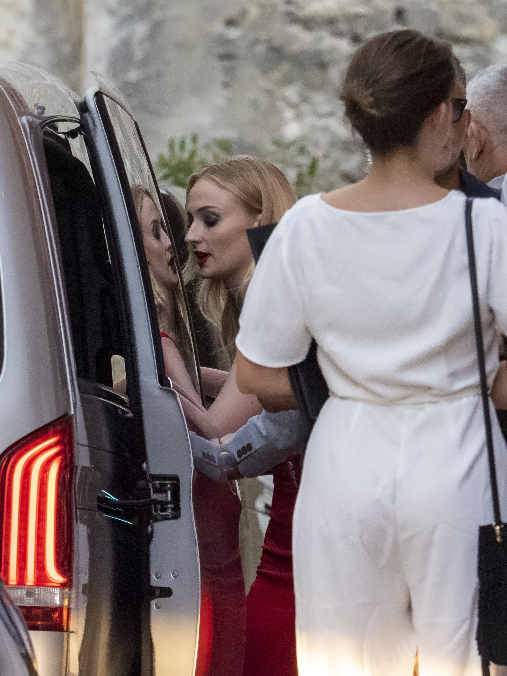 writhing-ant322: Sophie Turner in vintage bridal gown with flowers.