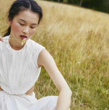 how to practice self-compassion a person in a white dress