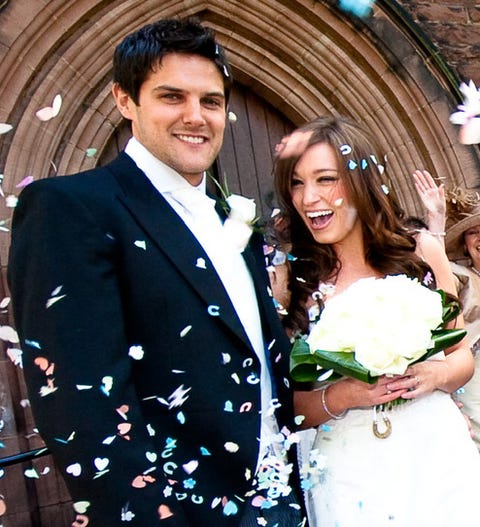 a man and woman posing for a picture