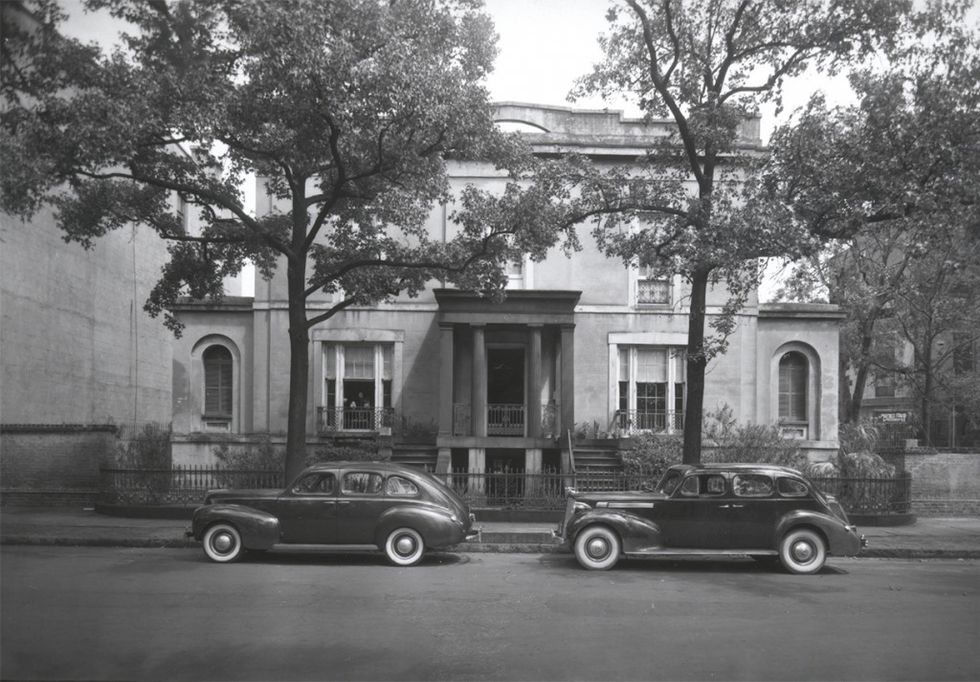 cars parked in front of a building