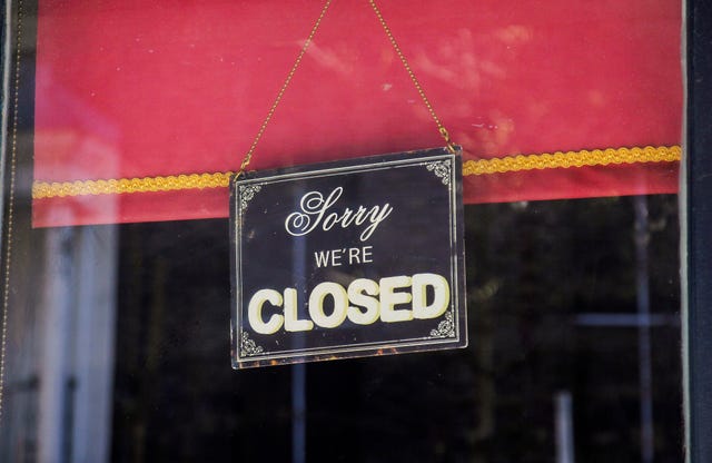 'sorry, we're closed' sign