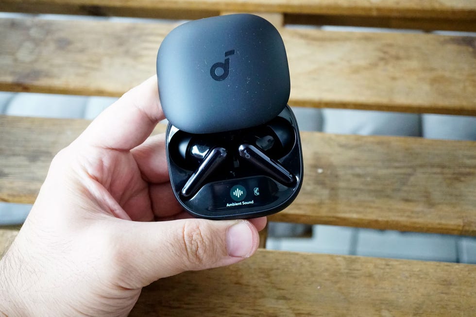 soundcore liberty 4 pro wireless earbuds with charging case held in hand