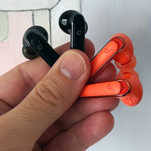 black and orange soundcore life p3 earbuds