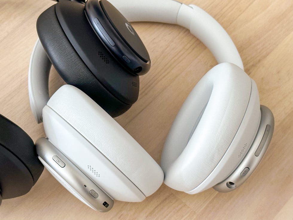 buttons on side of white and black soundcore q45 headphones