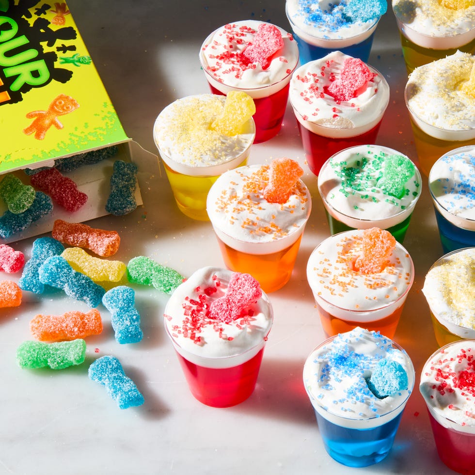 multicolored jello shots with sour patch kids candy