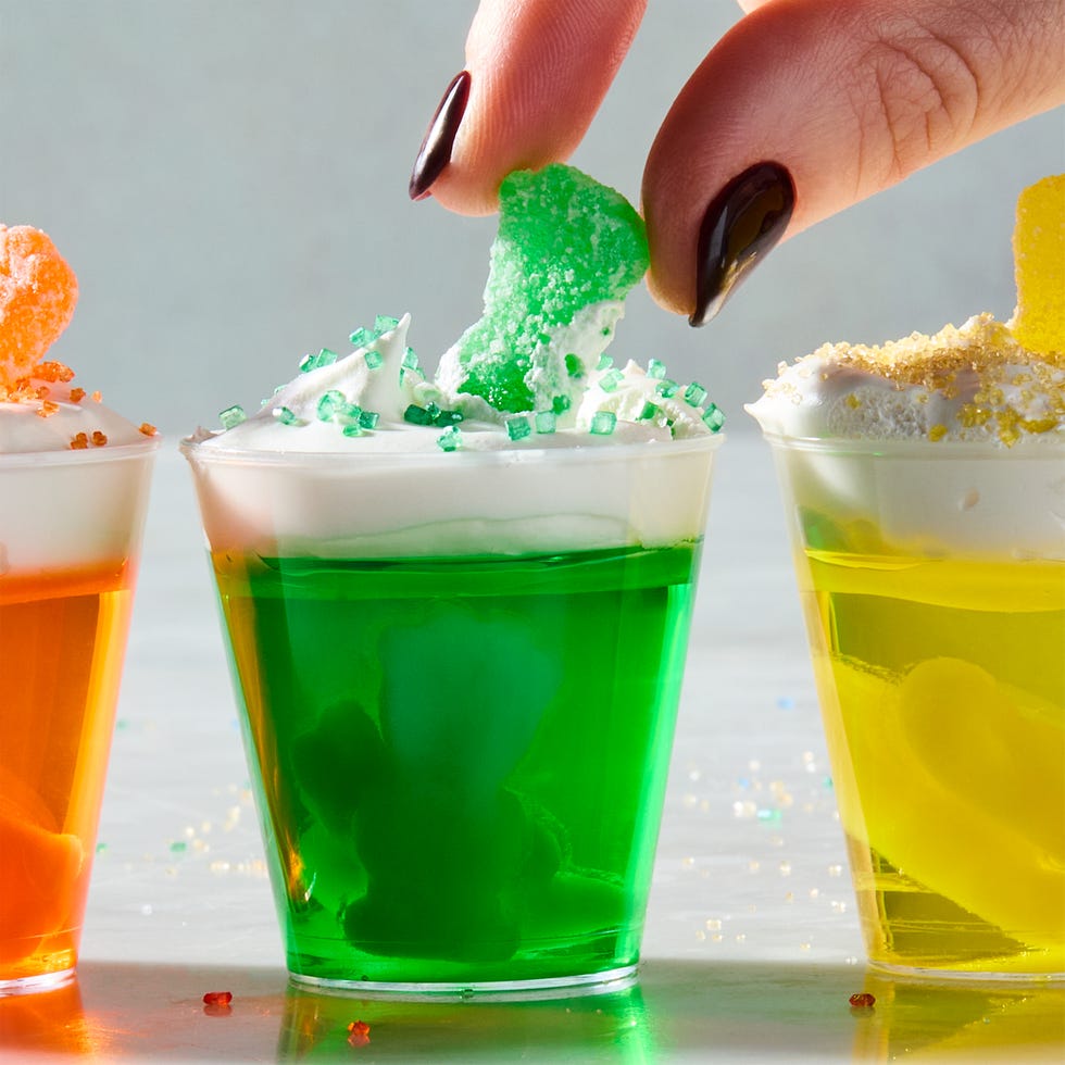 multicolored jello shots with sour patch kids candy