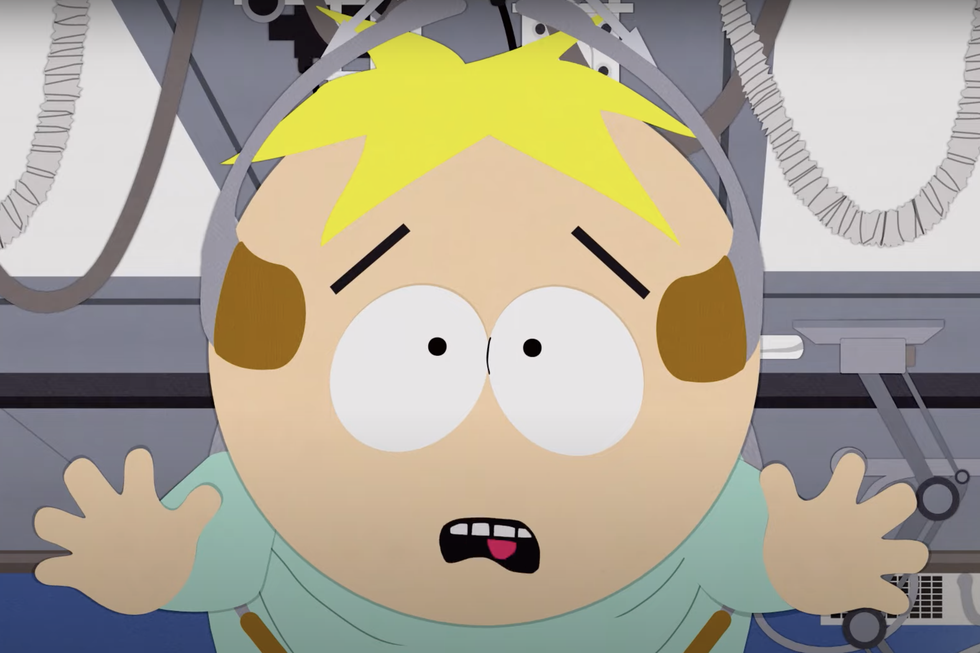 butters stotch looking terrified as he's suspended from the ceiling for a medical procedure in south park