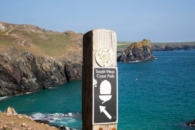 South West coast path waymark sign near, Kynance Cove, Lizard peninsula, Cornwall, England, UK