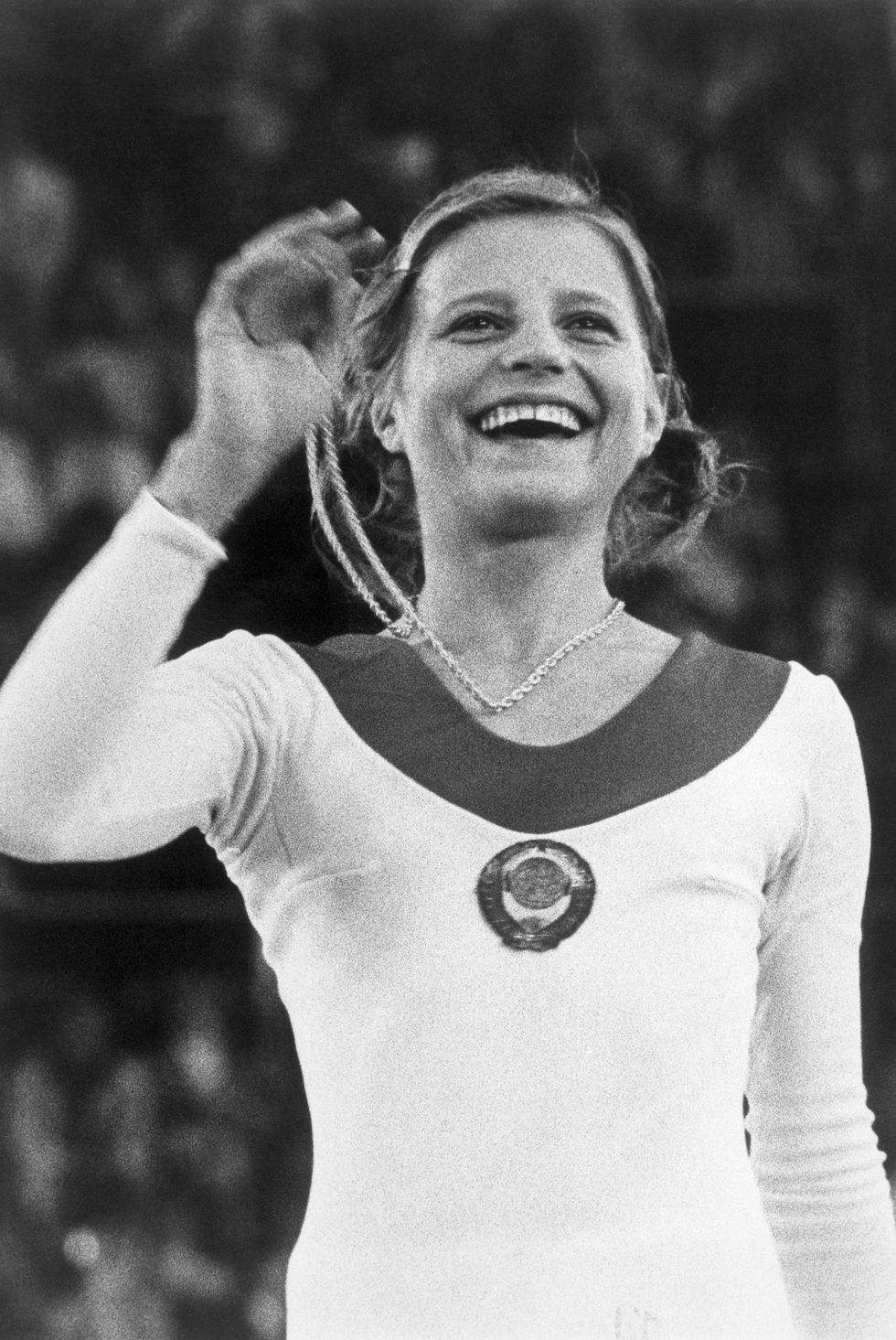 gymnast olga korbut holding gold medal, 1972