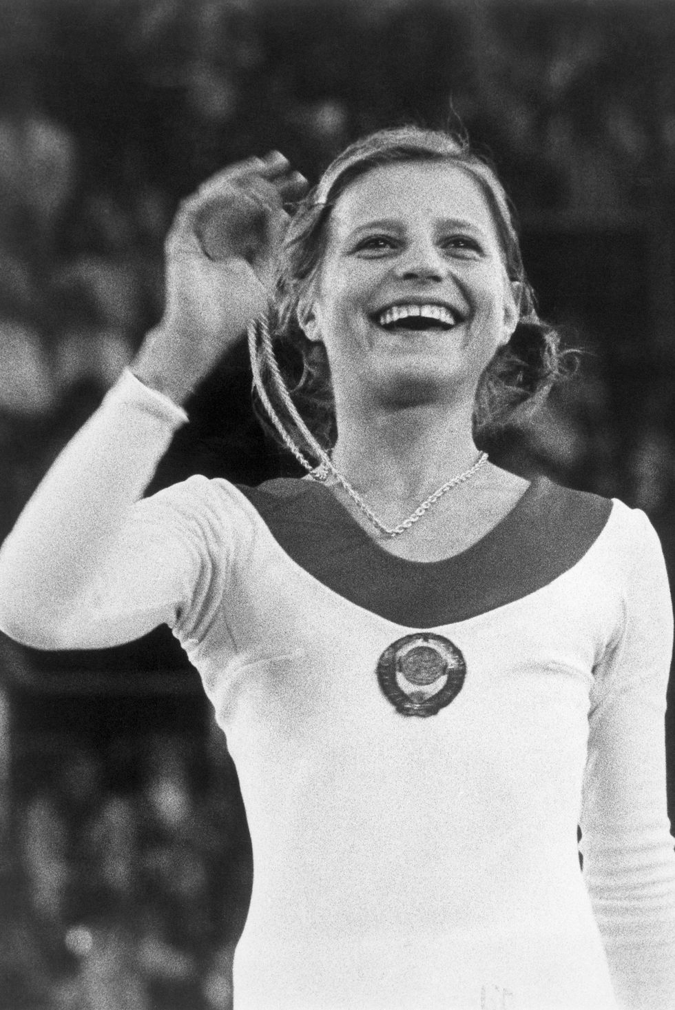 gymnast olga korbut holding gold medal, 1972