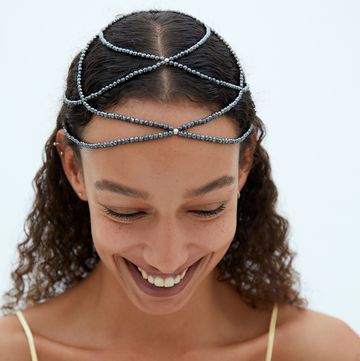 a woman with a headband