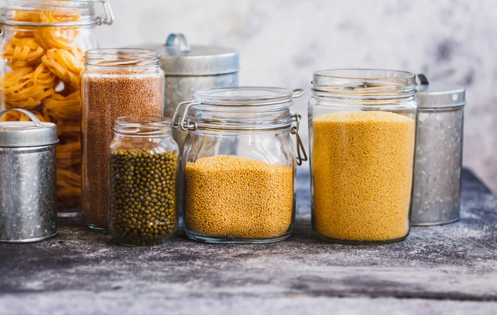 Soybeans, Quinoa, Bulgur And Couscous Cereals In Glass Jars