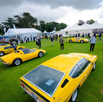 salon prive the yellow collection cars on grass