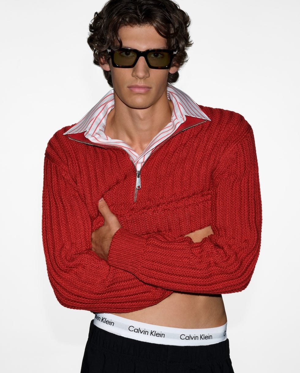 casual male outfit featuring a red sweater and calvin klein underwear