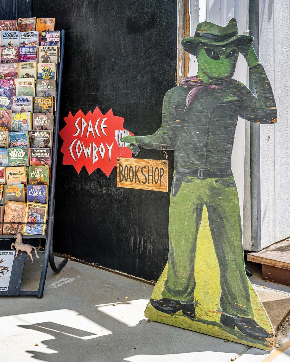 space cowboy books sign