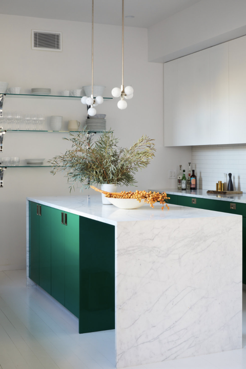 white kitchen with green cabinets