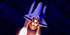 space shuttle launch, low angle view