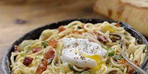 spaghetti carbonara with a poached egg